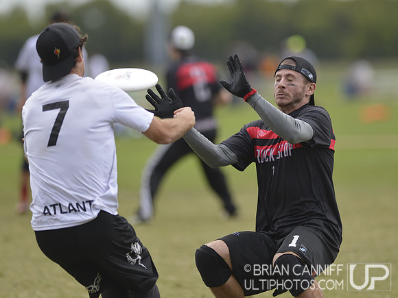 FRISCO, TX: Daniel Kantor (Truck Stop #1) breaks up a pass to Jay Clark (Chain Lightning #7) in bracket play at the USA Ultimate Men's National Championships. Friday, October 18, 2013. ©  Brian Cannif