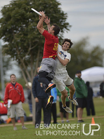 FRISCO, TX: Beau Kittredge (Revolver #50) scores over a Sub Zero defender in bracket play at the USA Ultimate National Championships. Friday, October 18, 2013. ©  Brian Canniff for UltiPhotos.com.