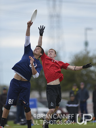 FRISCO, TX: Tyler Degirolamo (Doublewide #81) blocks a pass to Jackson Kloor (Johnny Bravo #24) in the elimination play at the USA Ultimate National Championships. Friday, October 18, 2013. ©  Brian C