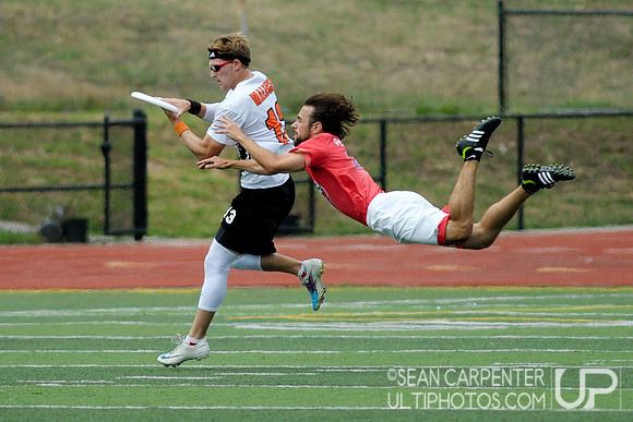 Spinner Michael Panna defends against Rhode Island