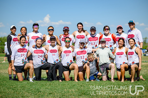 Nighttime team photo at USAU Master's Championships
