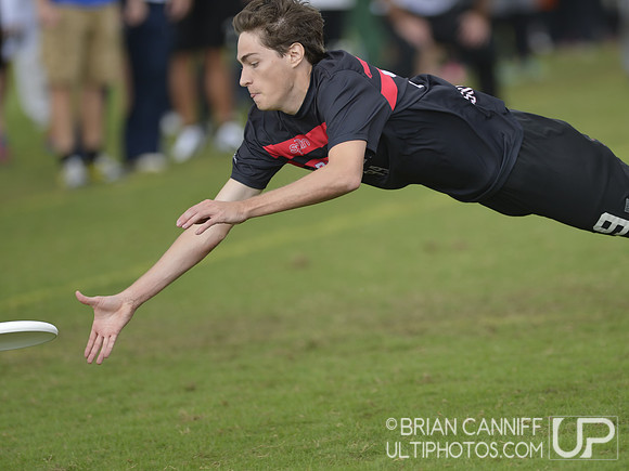 FRISCO, TX: Alan Kolick (Truck Stop #99) retains possession with an endzone layout against Chain Lightning in pool play at the USA Ultimate National Championships. Friday, October 18, 2013. ©  Brian C