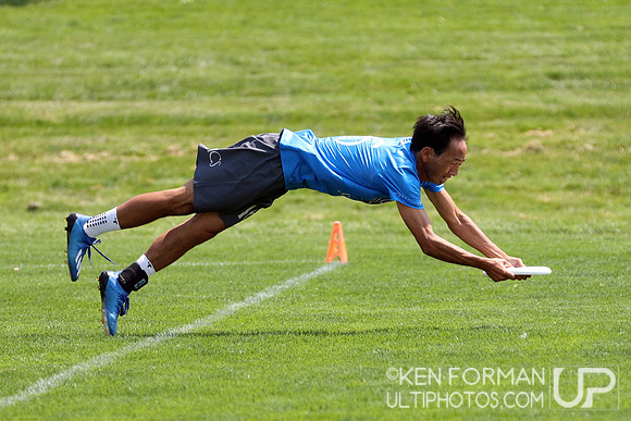 Peter Nieh (Relics #16) catches the disk while keeping his foot in during Pool Play at the 2021 USAU Masters National Championships