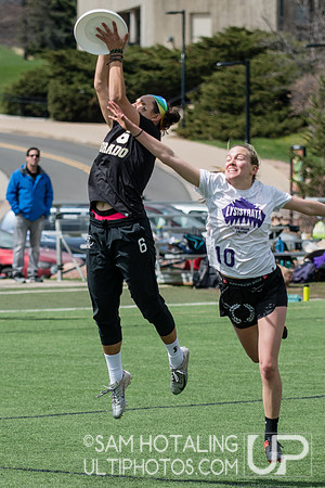 Emma Capra catches a high disc at Rocky Mountain DI Conf. Championships, Women's