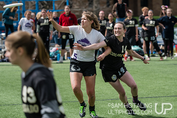 Elizabeth Rothrock battles CC 'Strata for a block at Rocky Mountain DI Conf. Championships, Women's