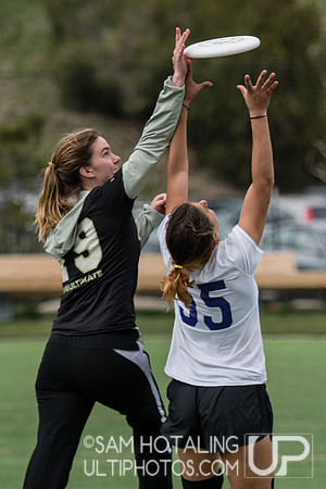 Bailey Shigley attempts a block at Rocky Mountain DI Conf. Championships, Women's