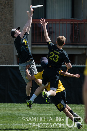 Alex Nichols skies for a goal despite contact at Rocky Mountain DI Conf. Championships, Men's
