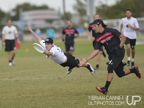 FRISCO, TX: Alan Kolick (Truck Stop #99) retains possession with an endzone layout against Chain Lightning in pool play at the USA Ultimate National Championships. Friday, October 18, 2013. ©  Brian C