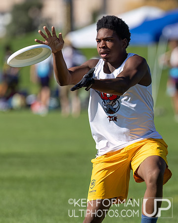 Eric Obioha (Flying Pig #65) handles the disc