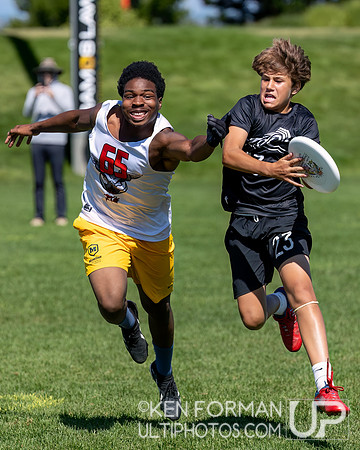 Lucas Morales (Rising Tide U20B #23) just ahead of Eric Obioha (Flying Pig #65)